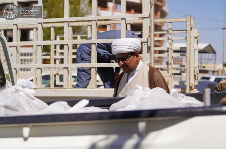 العتبة العلوية المقدسة توزّع سلّات غذائية على عوائل الشهداء في النجف الاشرف خلال شهر رمضان المبارك