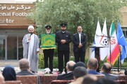 پرچم متبرک امام رضا(ع) در فدراسیون فوتبال برافراشته شد