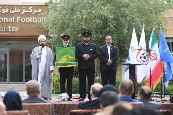 پرچم متبرک امام رضا(ع) در فدراسیون فوتبال برافراشته شد 
