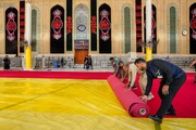 پهن کردن فرش قرمز در ورودی های حرم حضرت علی علیه السلام