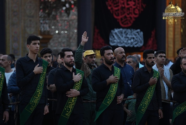 برافراشتن پرچم متبرک امام حسن مجتبی (ع) بر گنبد آستان مقدس کاظمیه