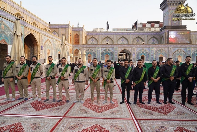 برافراشتن پرچم متبرک امام حسن مجتبی (ع) بر گنبد آستان مقدس کاظمیه