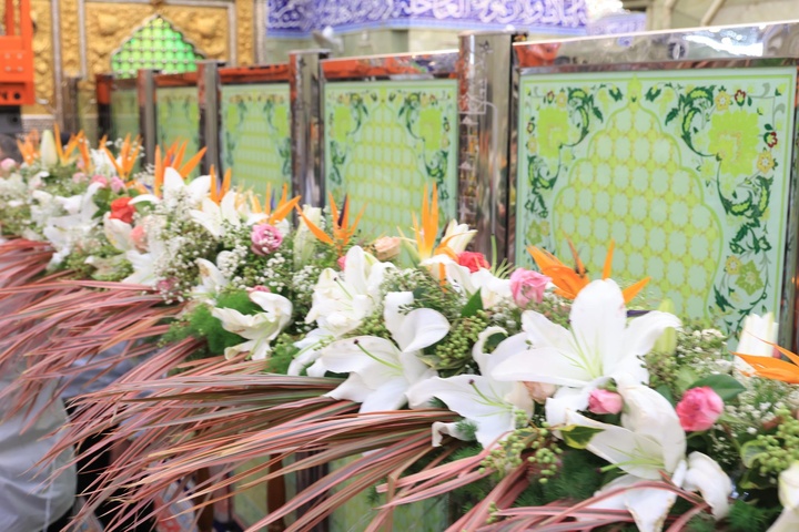 garlands of roses adorn the shrine of Aba al-Fadl al-Abbas (peace be upon him)