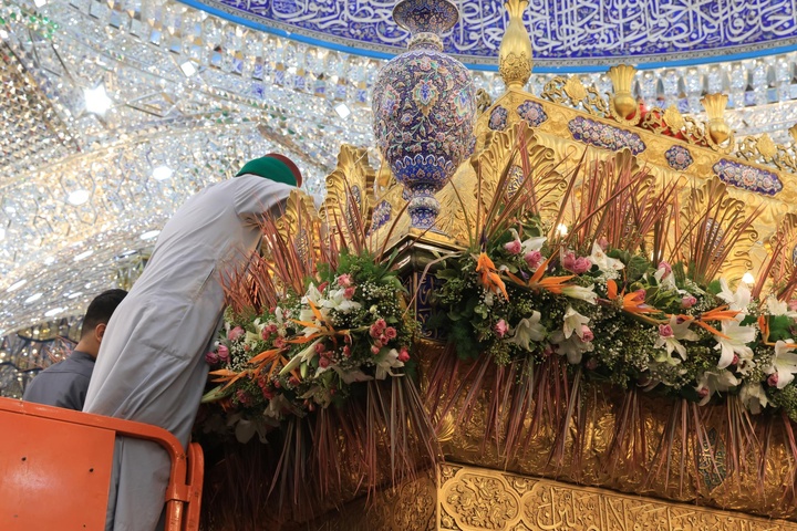 garlands of roses adorn the shrine of Aba al-Fadl al-Abbas (peace be upon him)