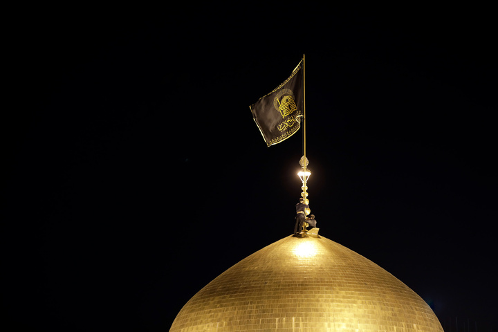 Imam Reza shrine raises black flags for national mourning days
