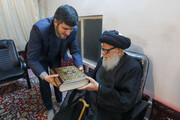 Imam Reza shrine custodian, Aalulbayt Center present Razavi Mashhad Mus’haf to Ayatollah Mortazavi