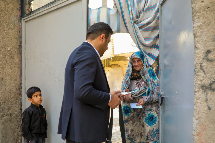 Invitation cards for Iftar meals distributed in Mashhad
