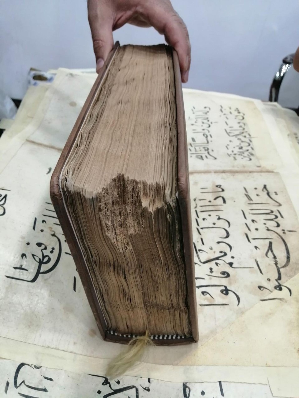 The Department of Intellectual Affairs begins the restoration of Qurans dating back to the thirteenth century Hijri

