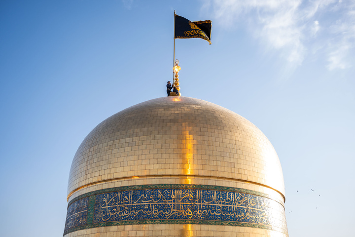 Imam Reza shrine hoists black flags marking Nasrallah’s martyrdom