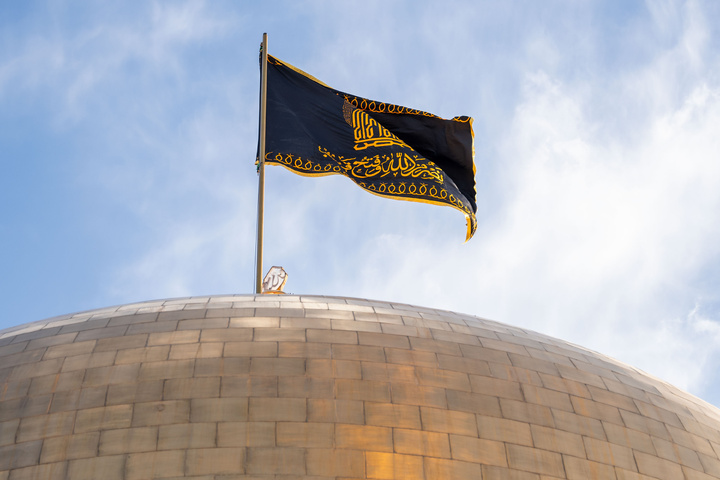 Imam Reza shrine hoists black flags marking Nasrallah’s martyrdom