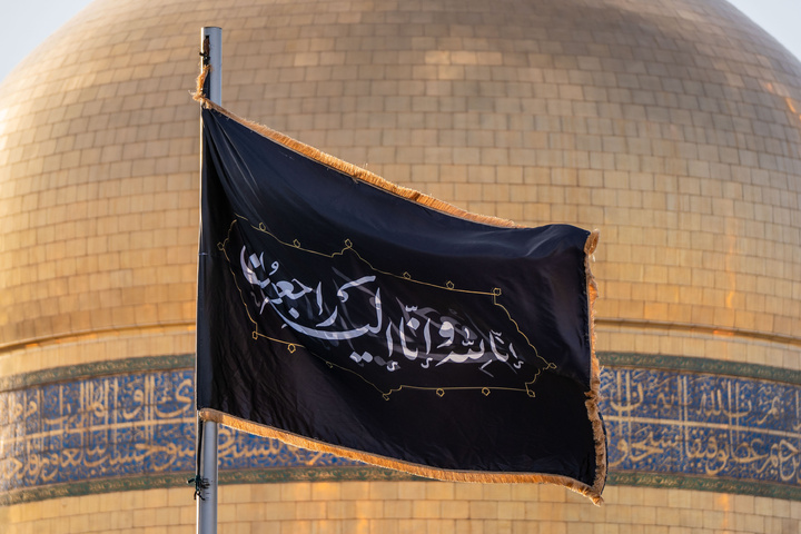 Imam Reza shrine hoists black flags marking Nasrallah’s martyrdom