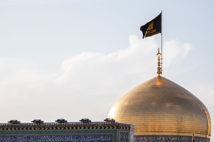 Imam Reza shrine hoists black flags marking Nasrallah’s martyrdom