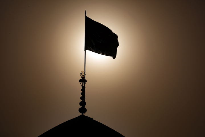 Mourning flag over holy shrine's dome