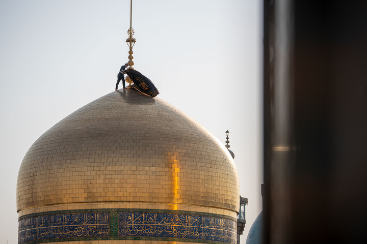 Mourning flag over holy shrine's dome