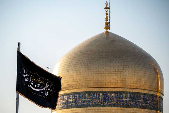 Mourning flag over holy shrine's dome