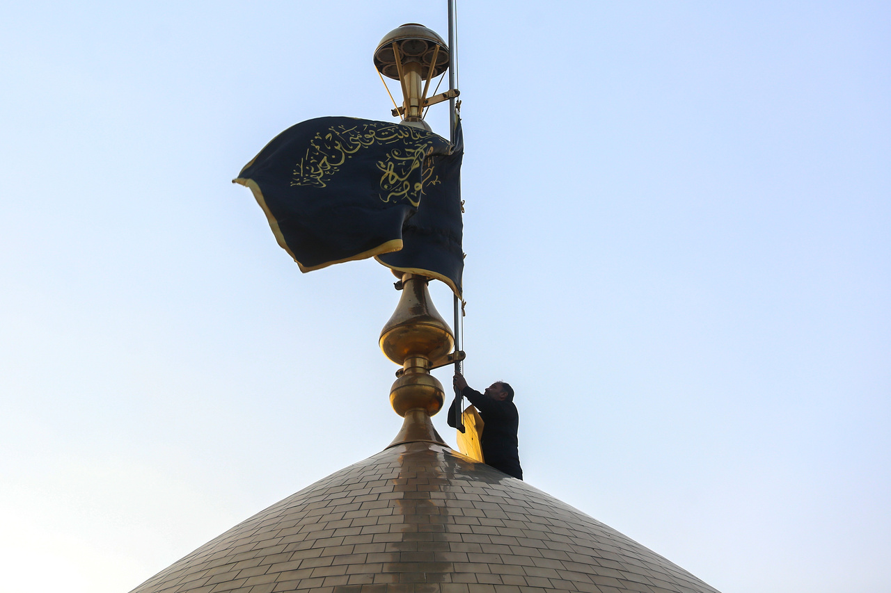 Mourning flag over holy shrine's dome