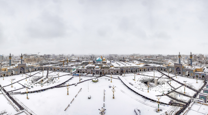 Autumn snow blankets Imam Reza shrine