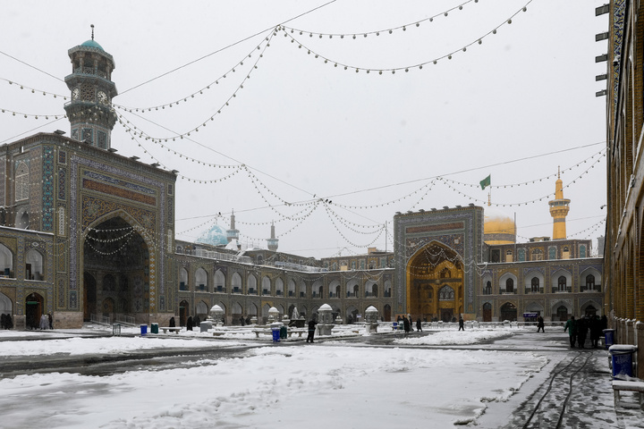 Autumn snow blankets Imam Reza shrine