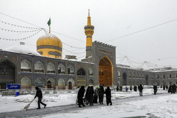 Autumn snow blankets Imam Reza shrine