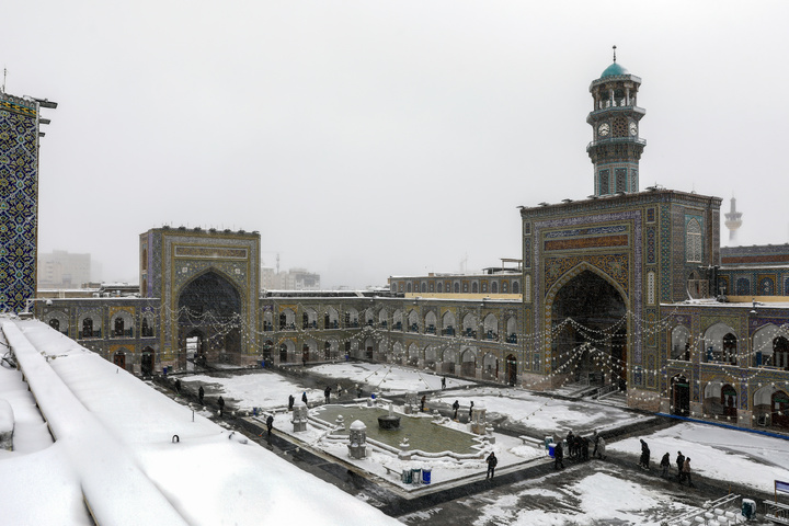 Autumn snow blankets Imam Reza shrine