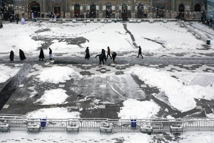 Autumn snow blankets Imam Reza shrine