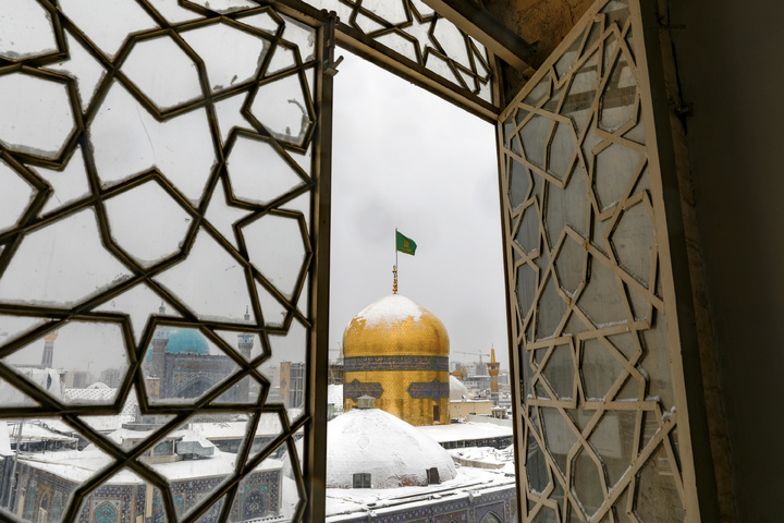 Autumn snow blankets Imam Reza shrine