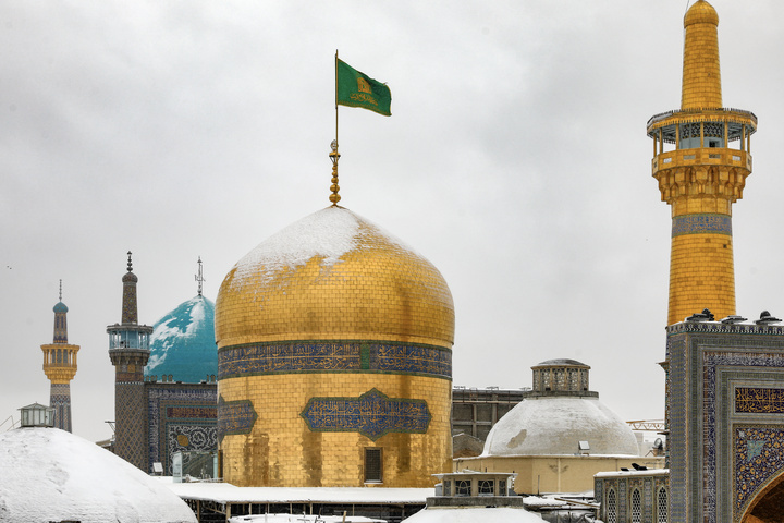 Autumn snow blankets Imam Reza shrine