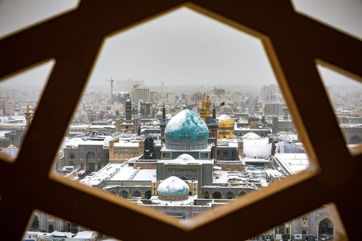 Autumn snow blankets Imam Reza shrine