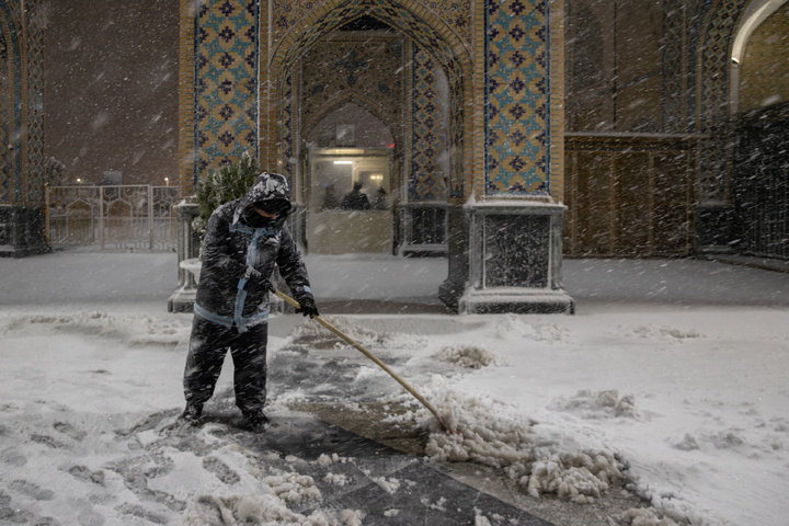 Autumn snow blankets Imam Reza shrine