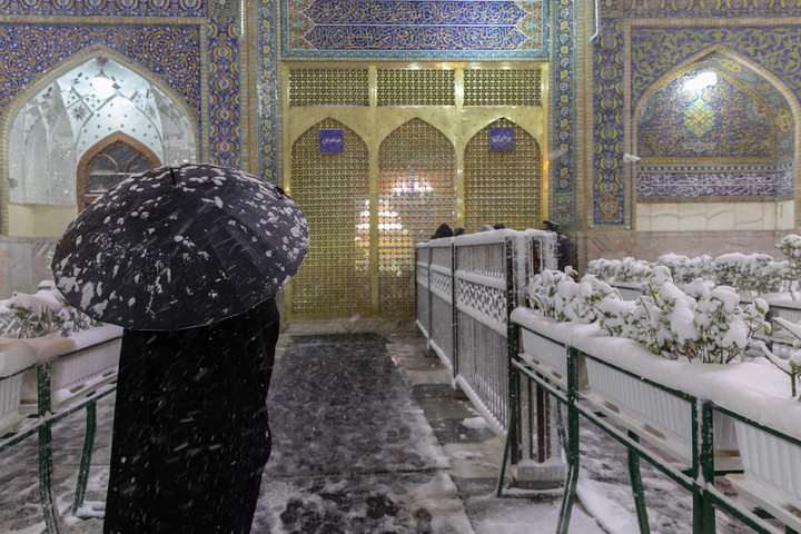 Autumn snow blankets Imam Reza shrine