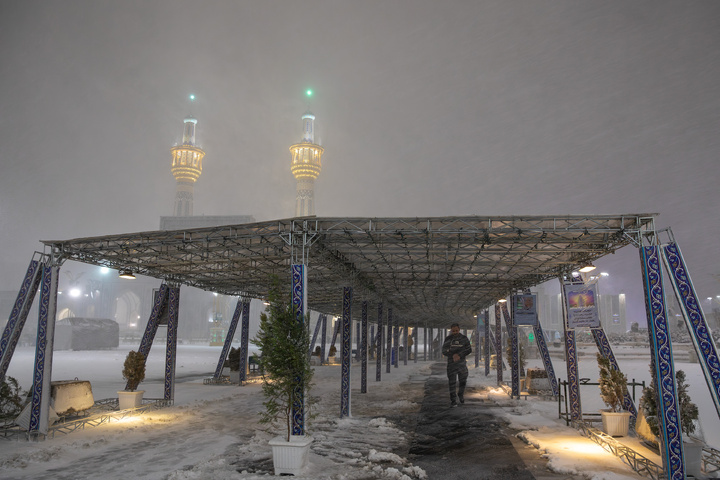 Autumn snow blankets Imam Reza shrine