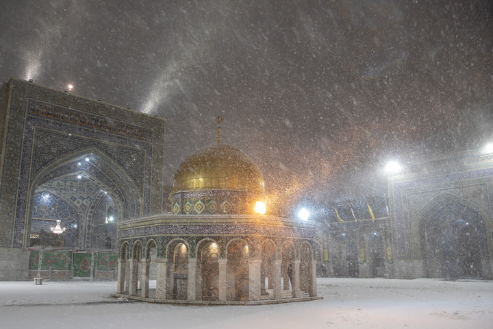 Autumn snow blankets Imam Reza shrine