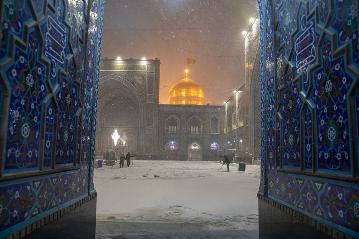 Autumn snow blankets Imam Reza shrine