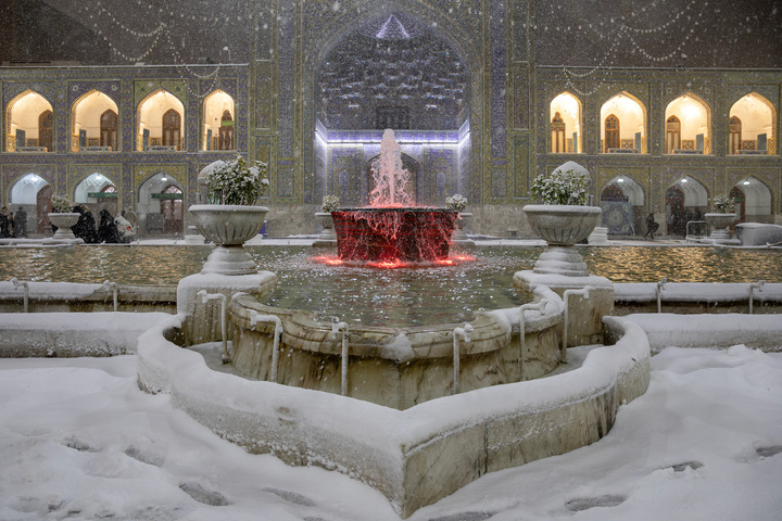 Autumn snow blankets Imam Reza shrine