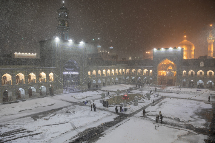 Autumn snow blankets Imam Reza shrine