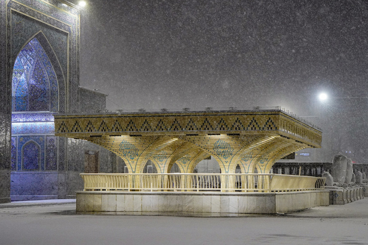 Autumn snow blankets Imam Reza shrine