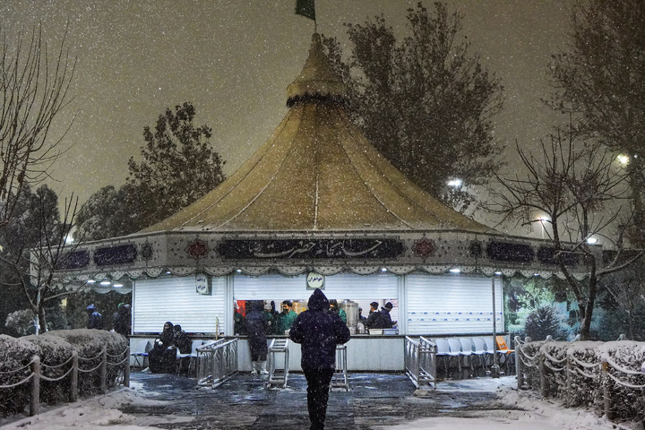 Autumn snow blankets Imam Reza shrine