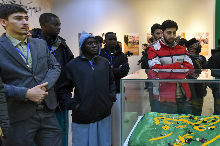 Participants of the 41st Intl. Quran Competition visit exhibition in Imam Reza shrine 