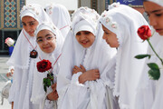 Young girls visit Imam Reza Shrine on birth anniv. of Hazrat Masumeh