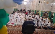 Syrian children celebrate “Coming of Age” ceremony at Imam Reza shrine
