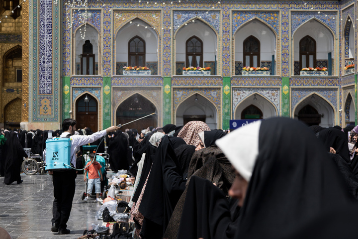Rosewater sprinkling at holy shrine