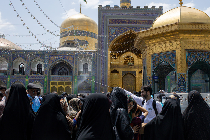 Rosewater sprinkling at holy shrine