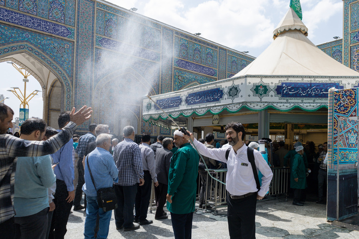 Rosewater sprinkling at holy shrine