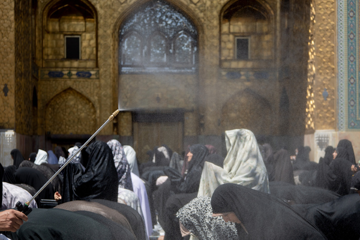 Rosewater sprinkling at holy shrine