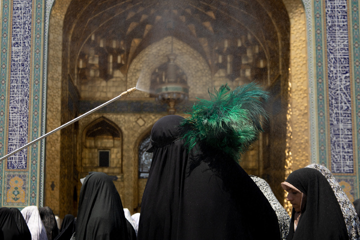 Rosewater sprinkling at holy shrine