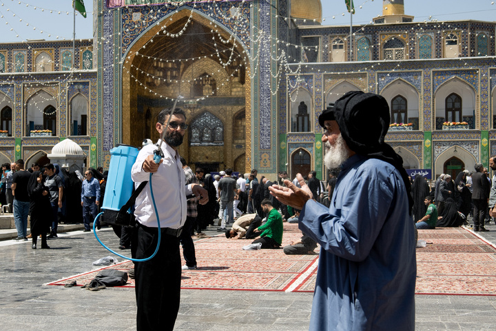 Rosewater sprinkling at holy shrine