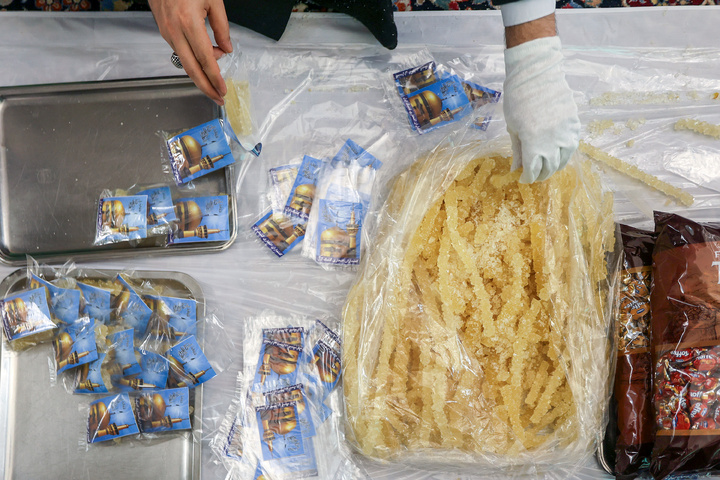 Thousands of rock candy packs distributed at Imam Reza Shrine 