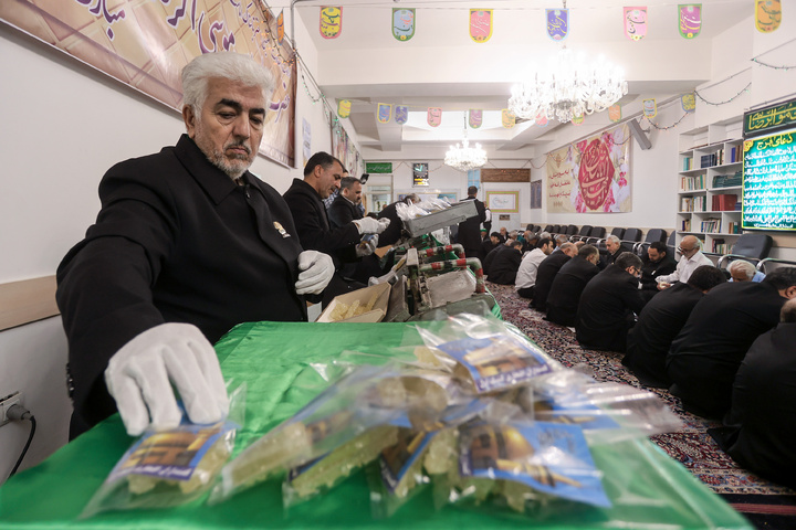 Thousands of rock candy packs distributed at Imam Reza Shrine 