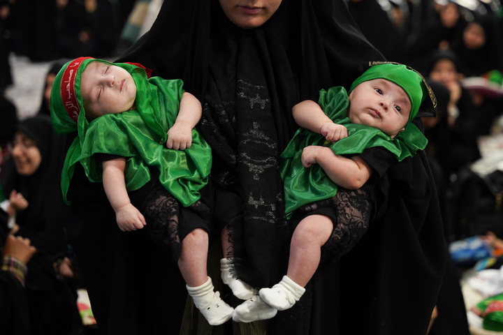 Spiritual ceremony of "Hosseini Infants" in Imam Reza shrine