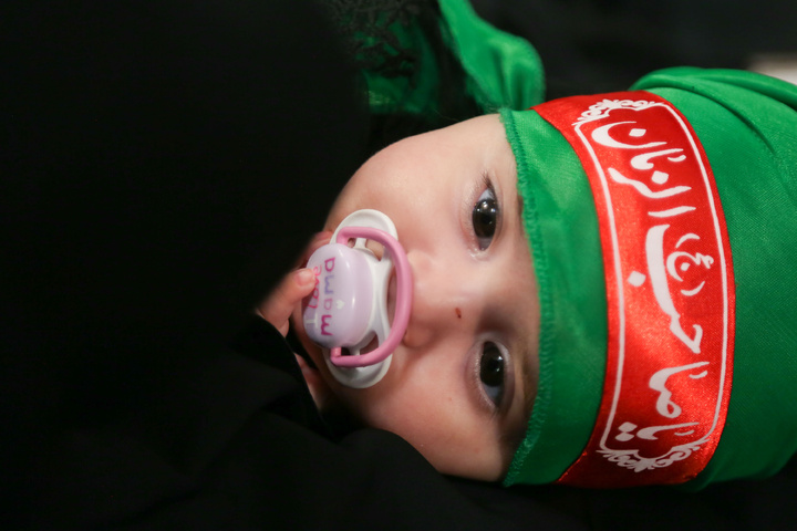 Spiritual ceremony of "Hosseini Infants" in Imam Reza shrine